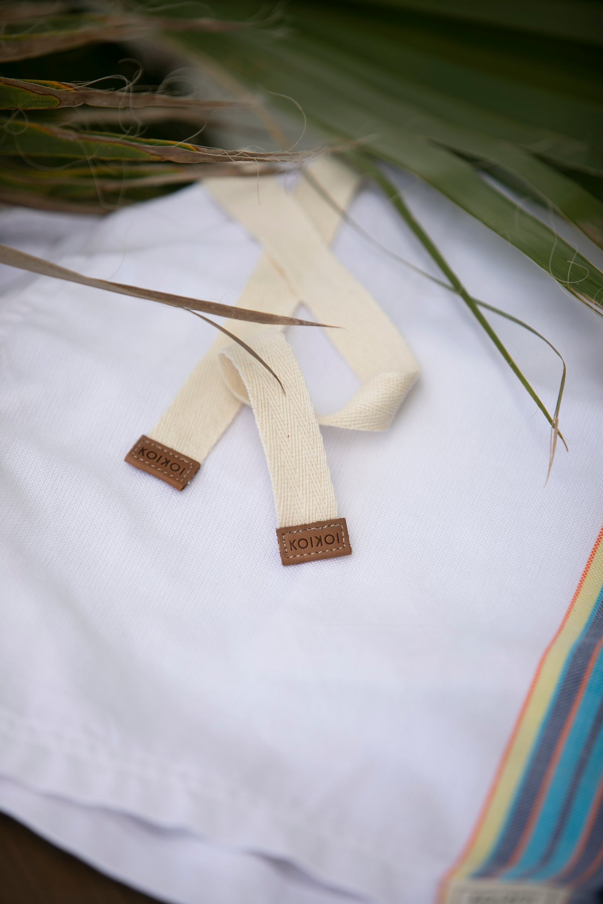 Natural cotton ties, leather tipped